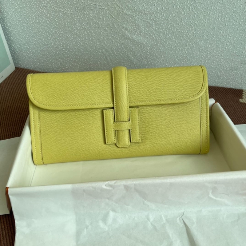 H**mes clutch bags